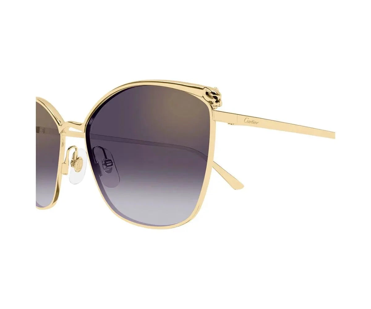 Gold-framed sunglasses with gradient lenses on a white background