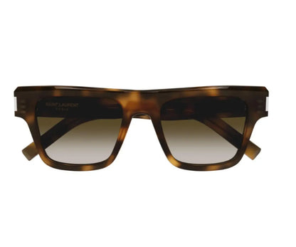 Sunglasses with tortoiseshell frame and gradient lenses on a white background
