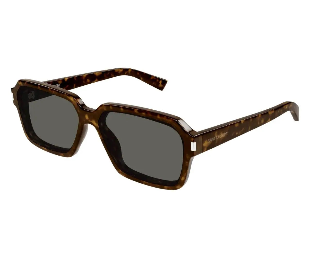 Sunglasses with tortoiseshell frame and dark lenses on a white background