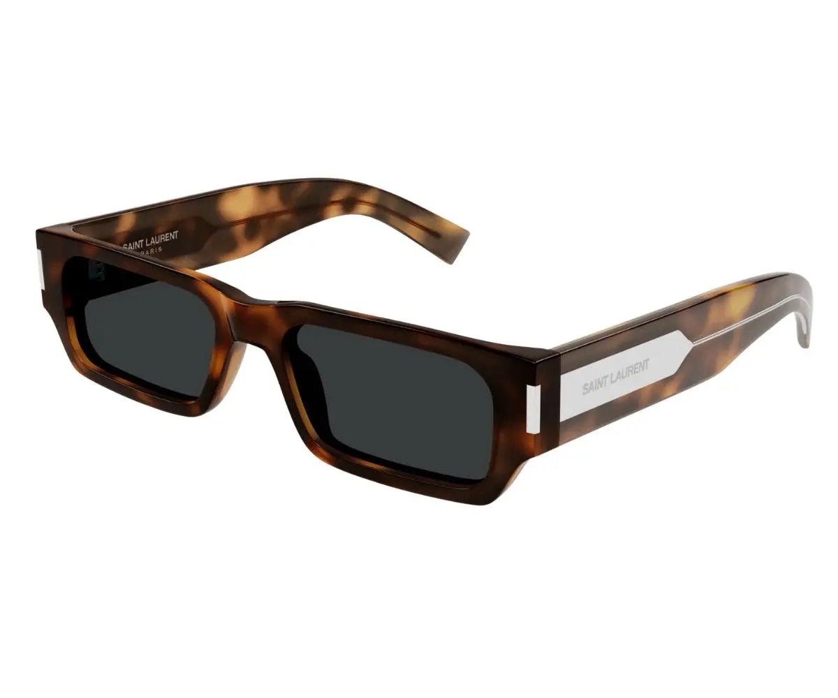 Sunglasses with tortoiseshell frame and dark lenses on a white background