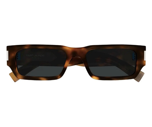 Sunglasses with tortoiseshell frame and dark lenses on a white background