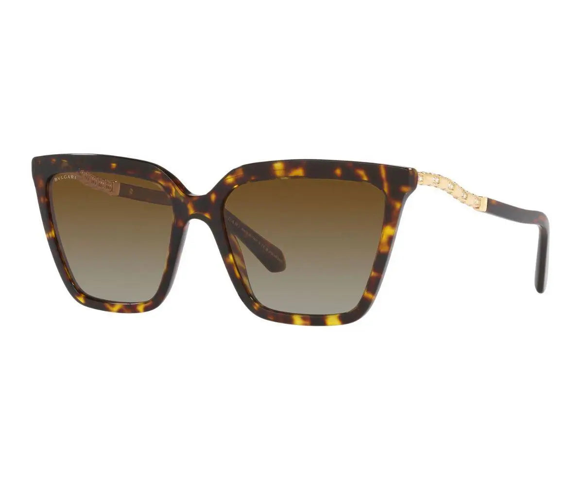 Sunglasses with tortoiseshell frame and brown gradient lenses on a white background