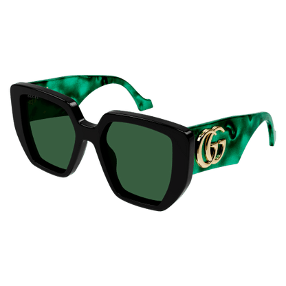 Sunglasses with green satin arms featuring a gold logo on a white background