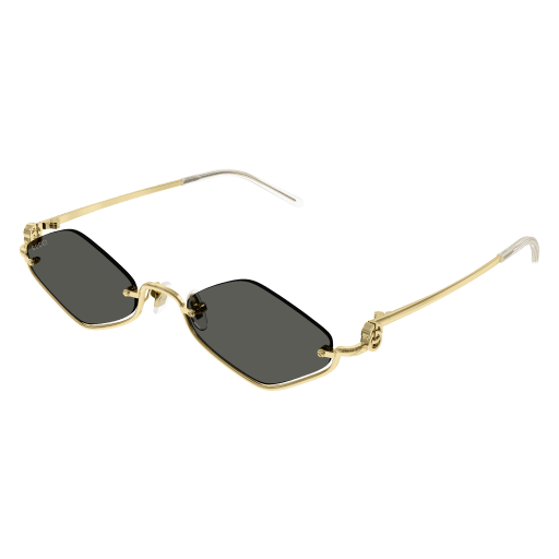 Gold-framed sunglasses with black lenses on a transparent background