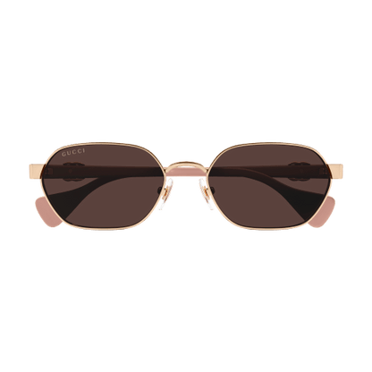 Sunglasses with gold frame and dark lenses on a transparent background