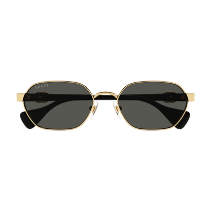 Gold-framed sunglasses with dark lenses on a transparent background