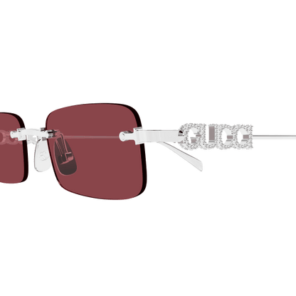 Sunglasses with maroon lenses and white frame on a transparent background