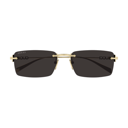 Sunglasses with gold frame and black lenses on a white background