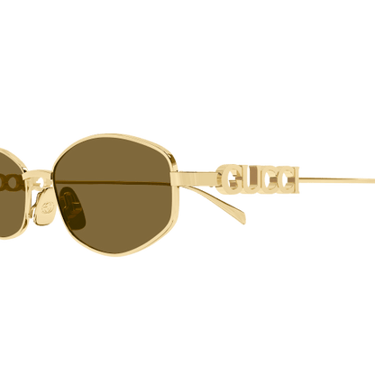 Gold-framed sunglasses with a clear background