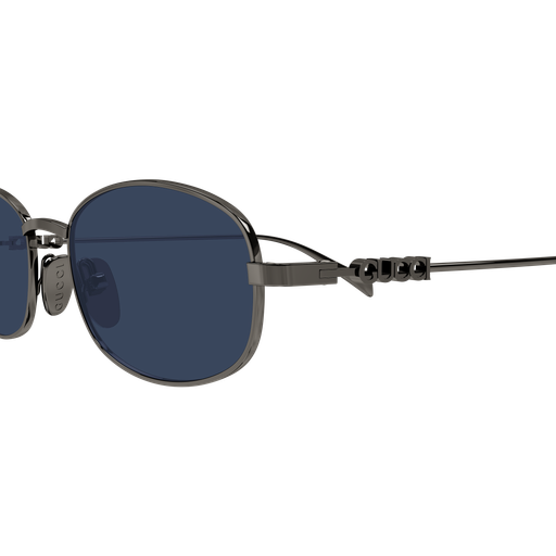 Round sunglasses with dark lenses and metallic frame on a white background