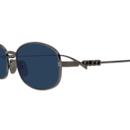 Round sunglasses with dark lenses and metallic frame on a white background