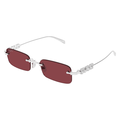 Sunglasses with red lenses and clear frame on a white background