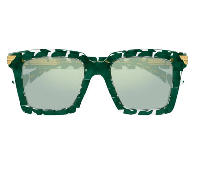 Green sunglasses with a patterned frame on a white background