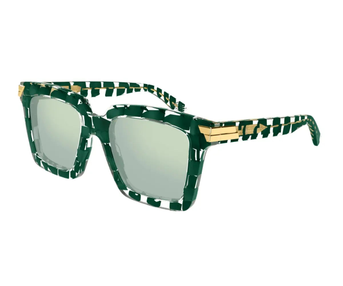Green sunglasses with gold accents on a white background