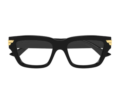 Black cat-eye glasses with gold accents on a white background