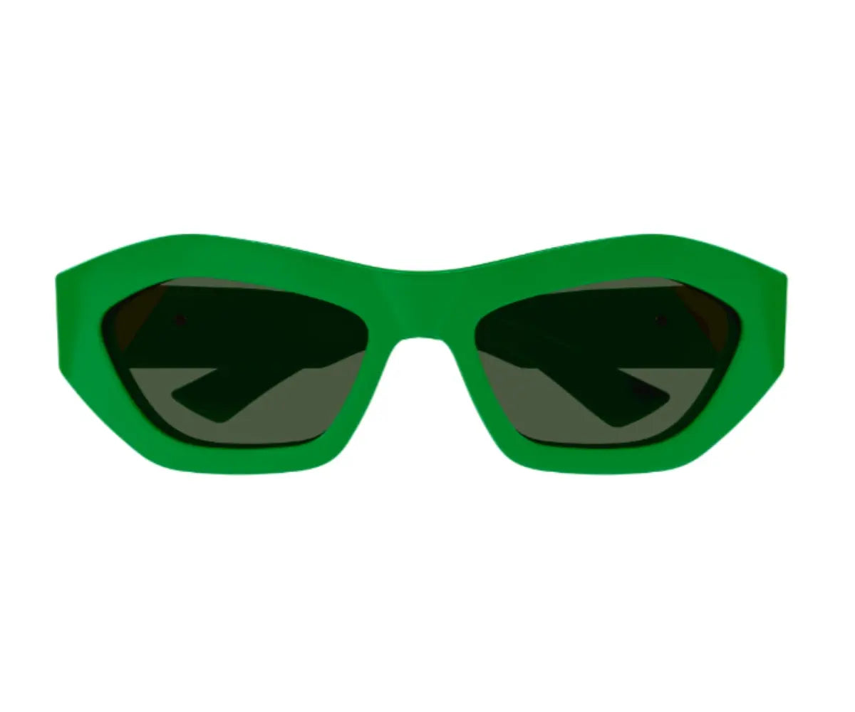 Green sunglasses with dark lenses on a white background