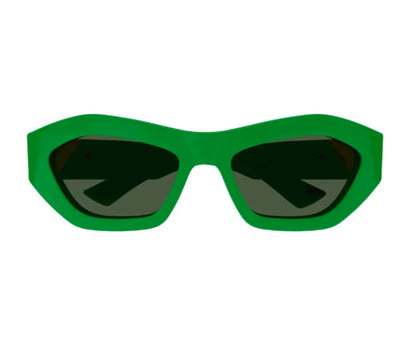 Green sunglasses with dark lenses on a white background