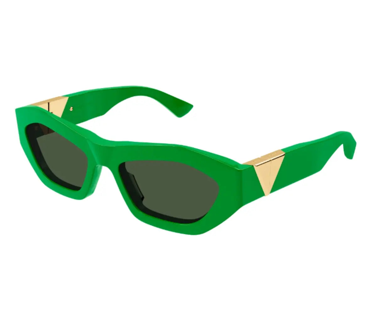 Green sunglasses with gold accents on a white background