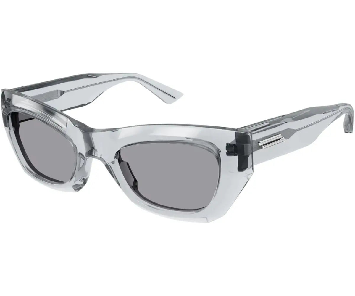 Clear frame sunglasses with dark lenses on a white background