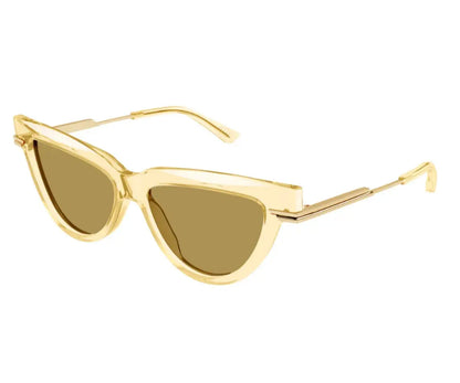 Gold cat-eye sunglasses on a white background
