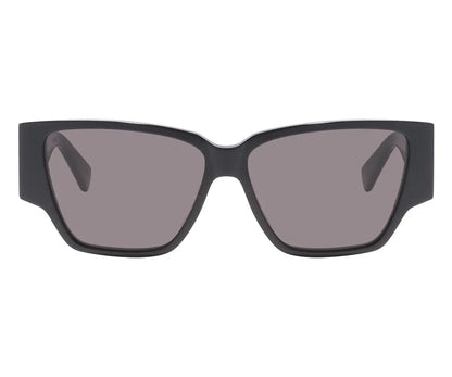 Black sunglasses with dark lenses on a white background