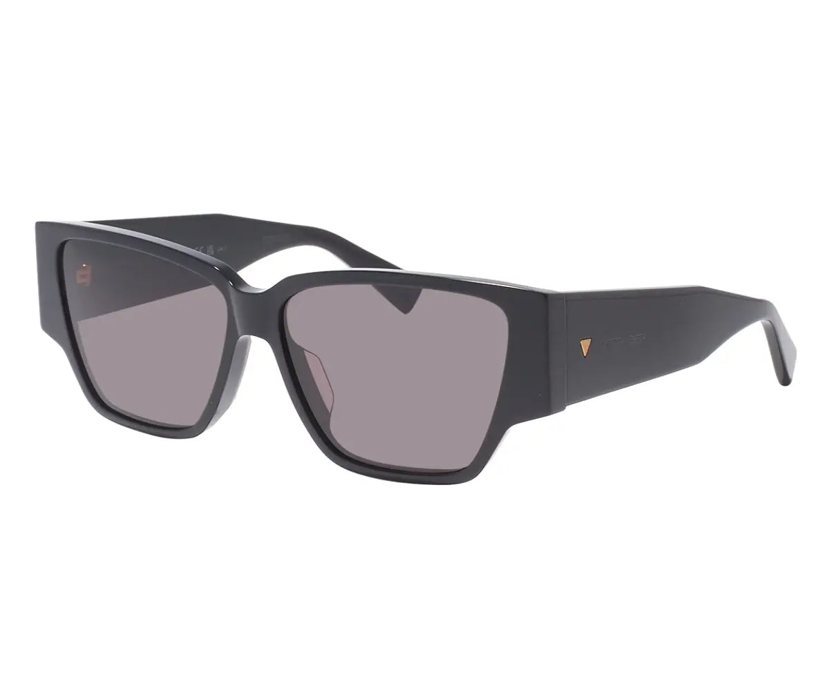 Black sunglasses with gray lenses on a white background