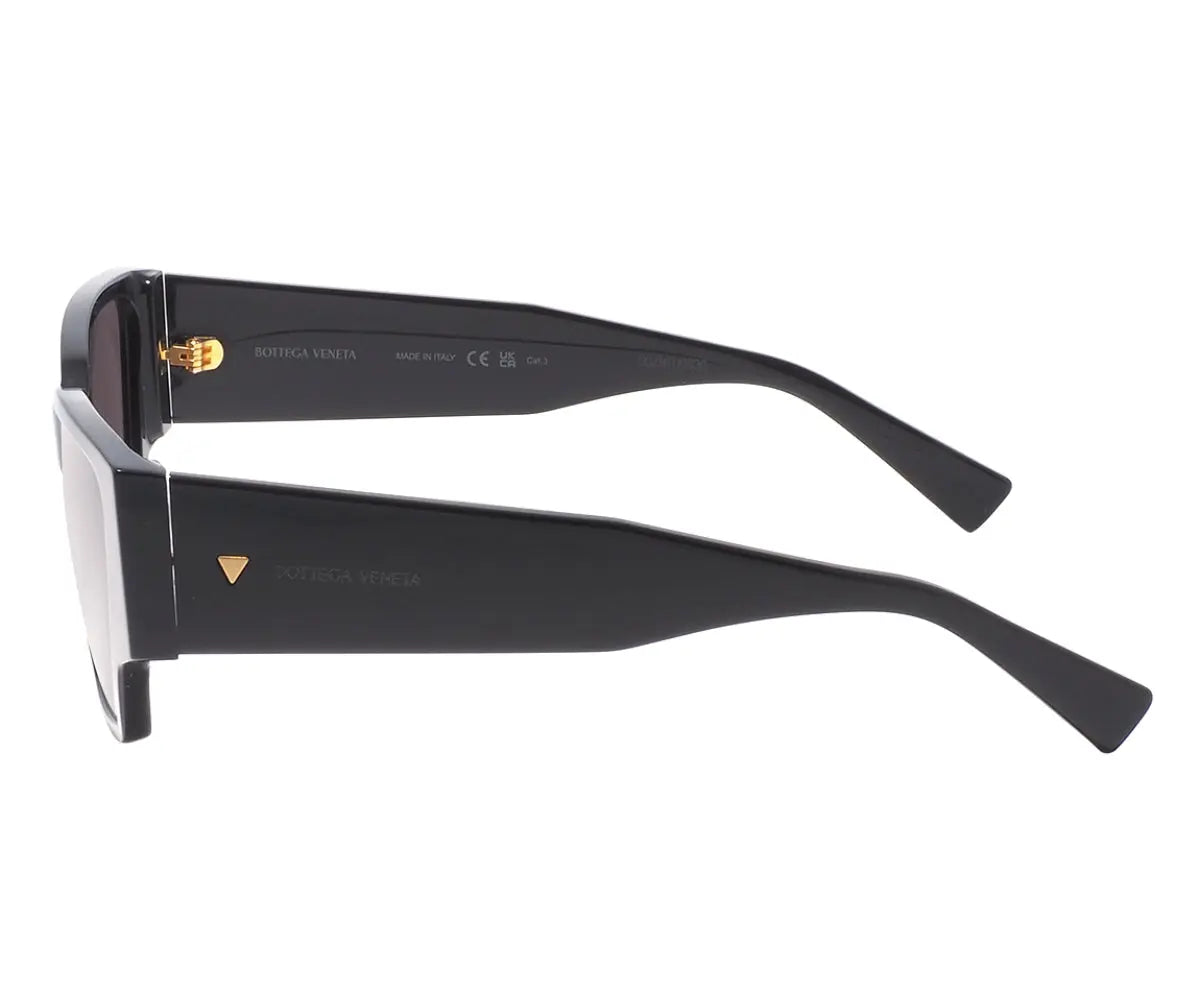 Black sunglasses with gold accents on a white background