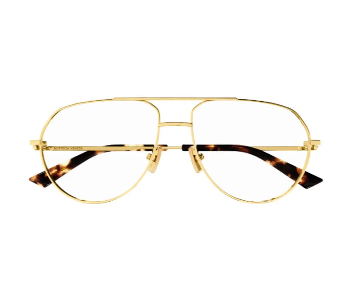 Gold-framed eyeglasses with tortoiseshell arms on a white background