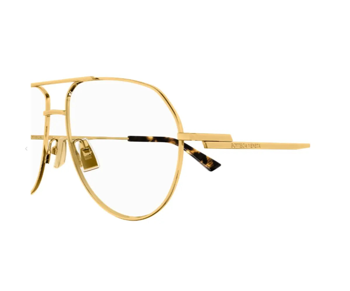 Gold eyeglasses on a white background