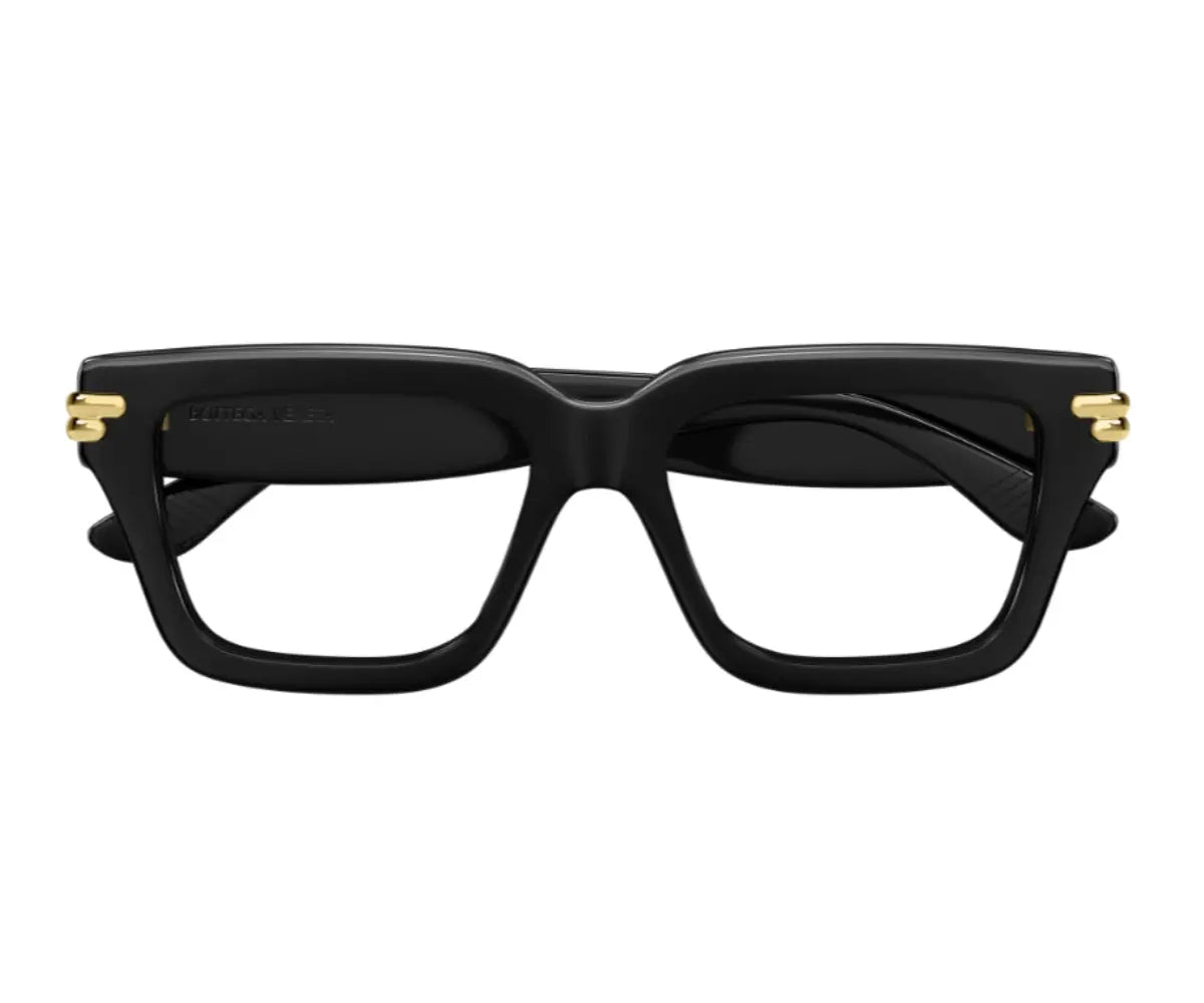 Black glasses with gold accents on a white background