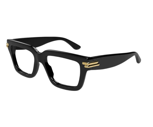 Black eyeglasses with gold accents on a white background
