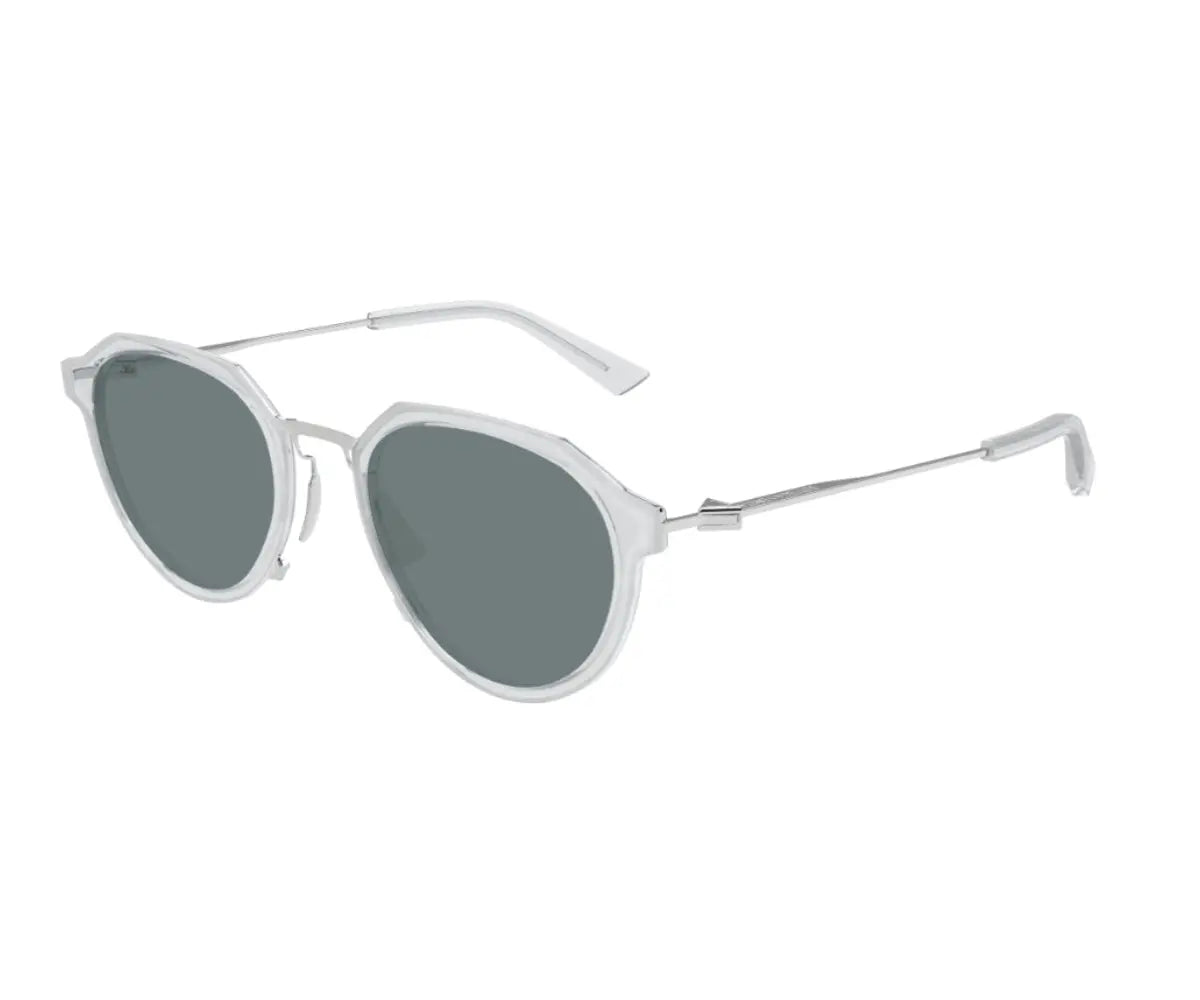 Gold-framed sunglasses with dark lenses on a white background