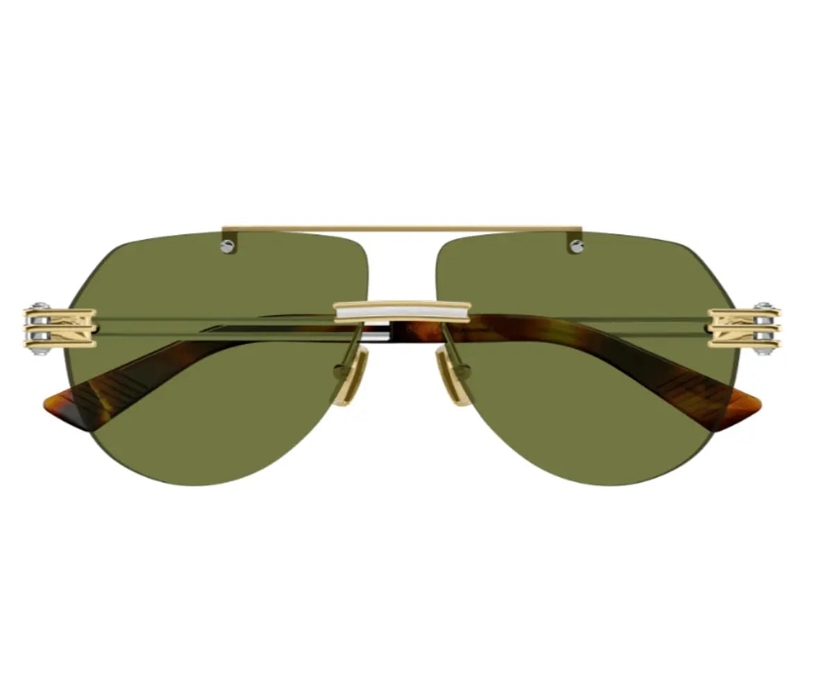 Gold-framed sunglasses with green lenses on a white background