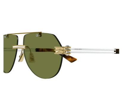Sunglasses with gold frame and green lenses on a white background