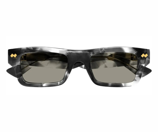 Sunglasses with a black and gold design on a white background