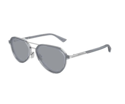 Sunglasses with gray lenses and metal frame on a white background
