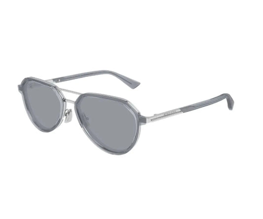 Sunglasses with gray lenses and metal frame on a white background