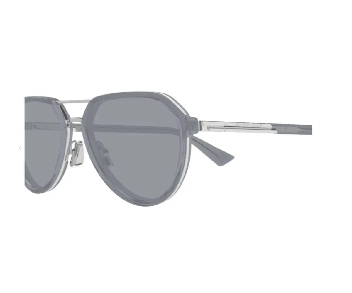 Sunglasses with gray lenses and silver frame on a white background