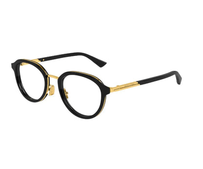 Black and gold eyeglasses on a white background