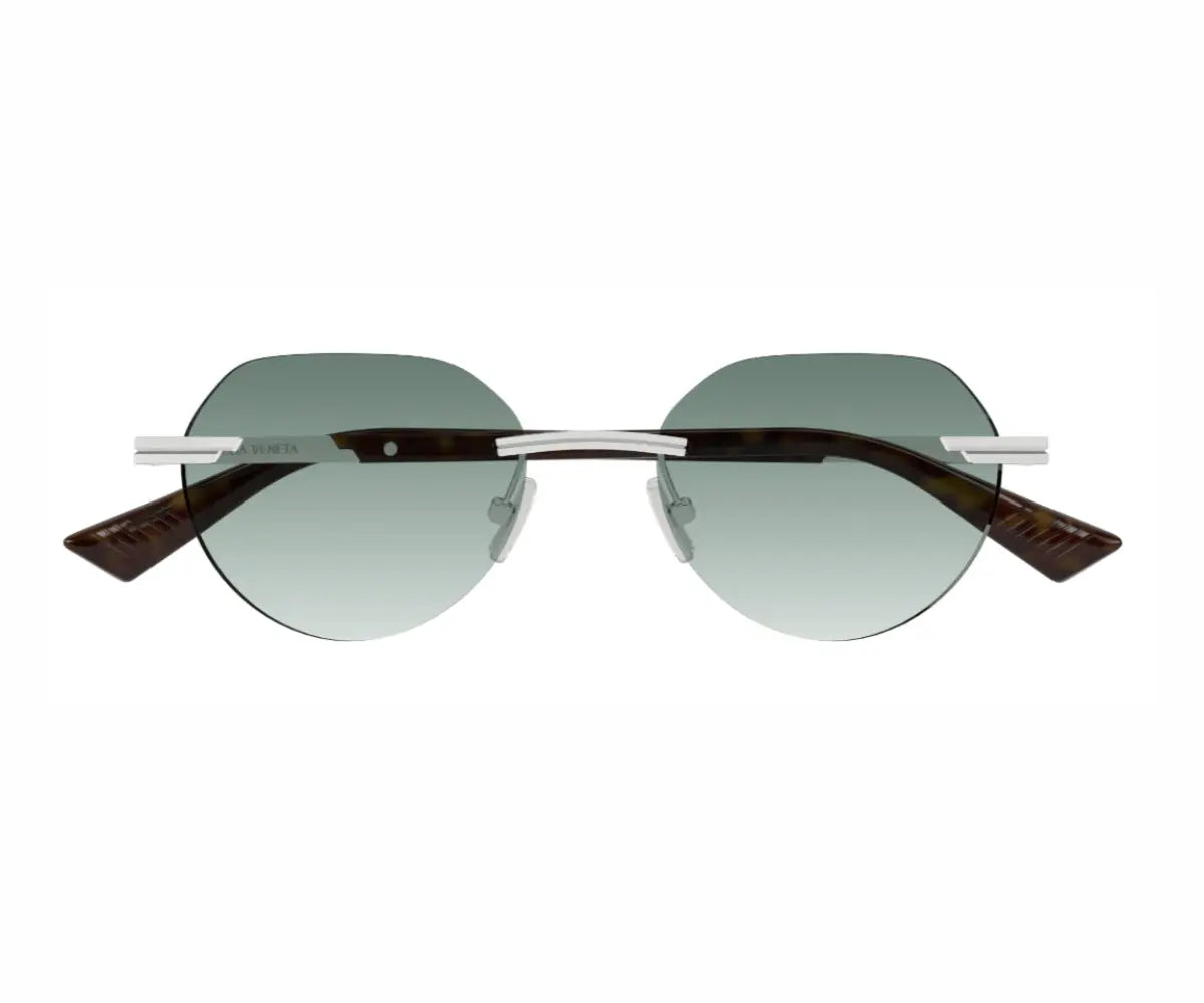 Round sunglasses with gradient lenses on a white background