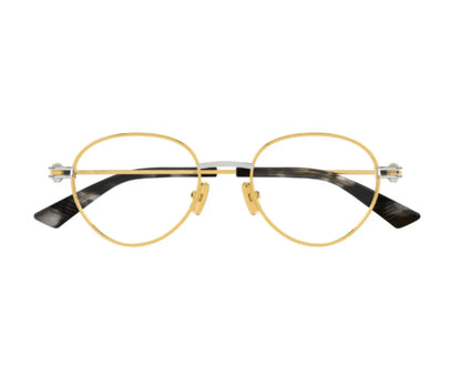 Gold-rimmed eyeglasses on a white background