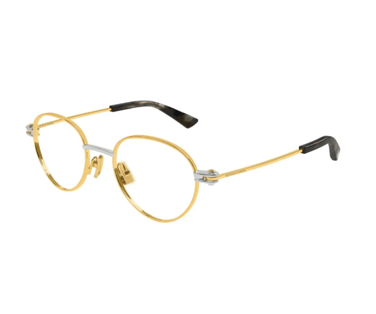 Gold and silver eyeglasses with black temple tips on a white background
