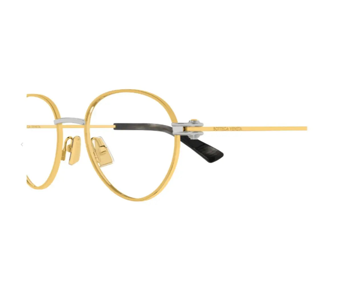 Gold-rimmed eyeglasses on a white background