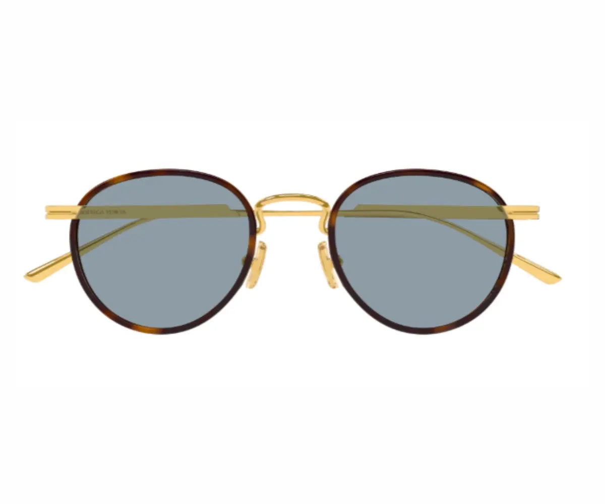 Round sunglasses with gold frame and dark lenses on a white background