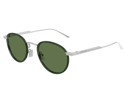 Sunglasses with green lenses and silver frames on a white background