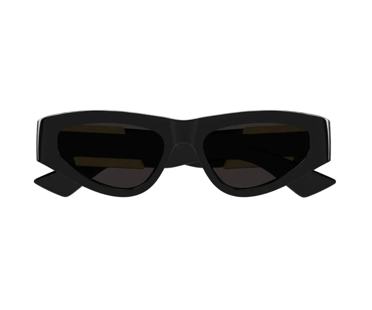 Black sunglasses with a bow on a white background