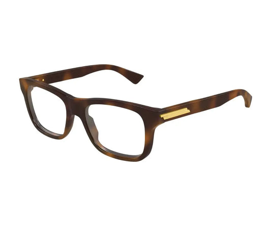 Brown eyeglasses with a gold accent on a white background