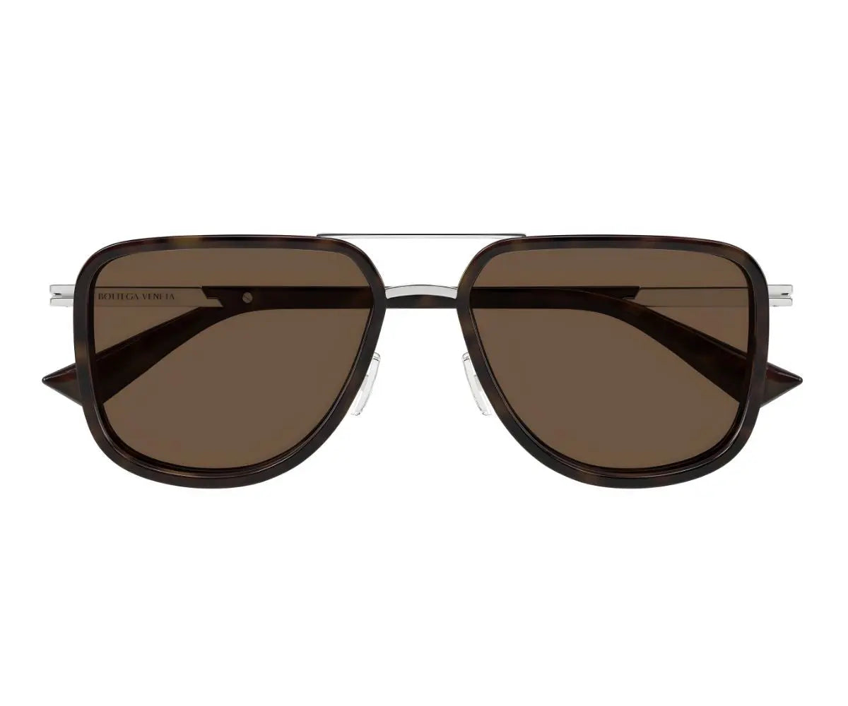 Sunglasses with brown lenses and black frame on a white background