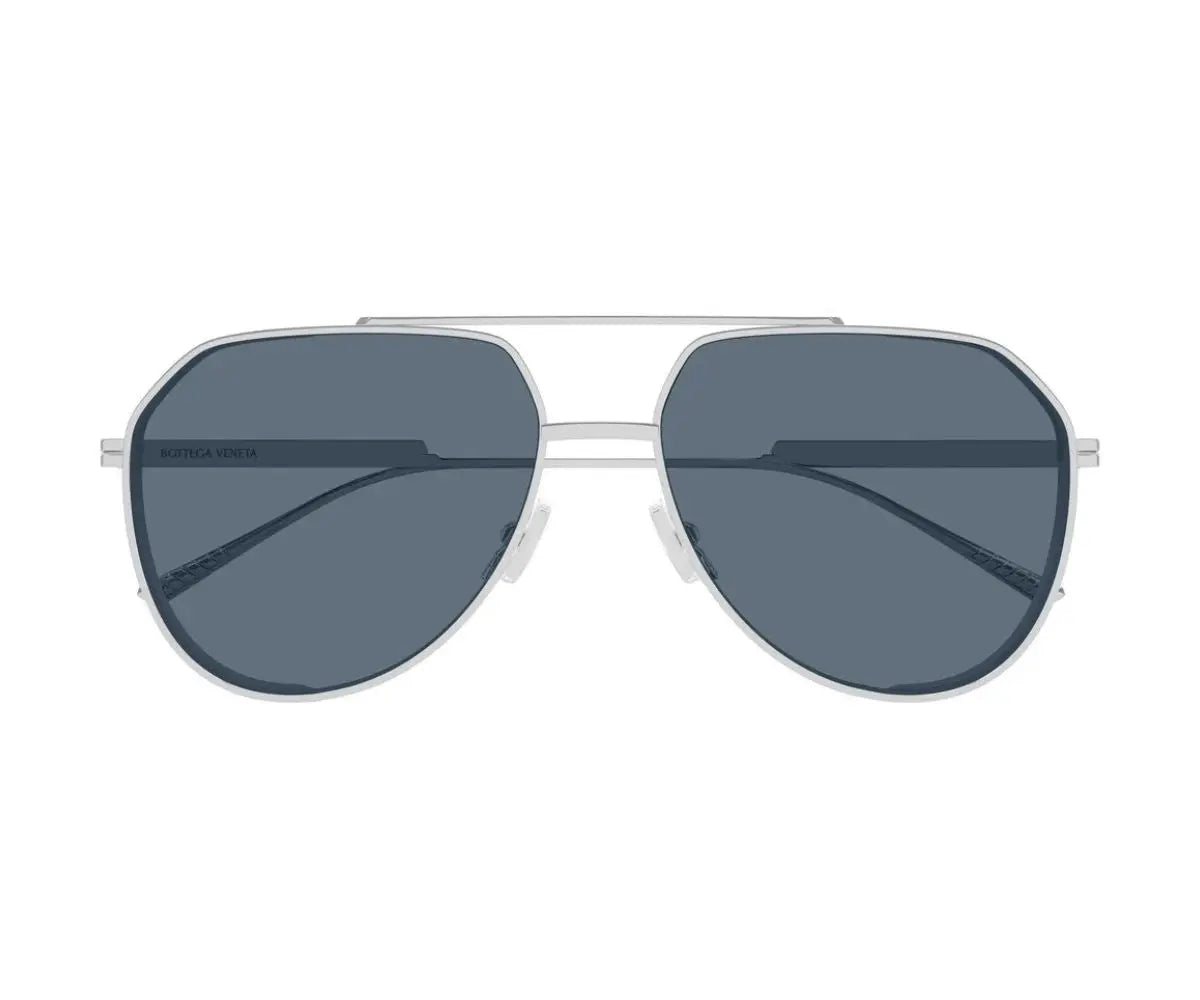 Aviator sunglasses with dark lenses and silver frame on a white background