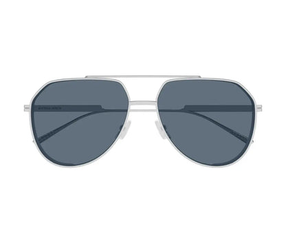 Aviator sunglasses with dark lenses and silver frame on a white background